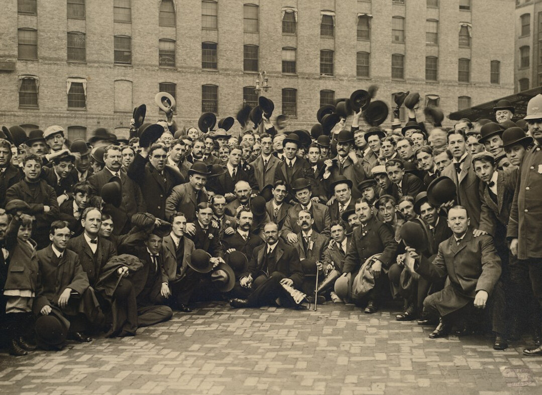 Team of broadcast training instructors standing together in a studio