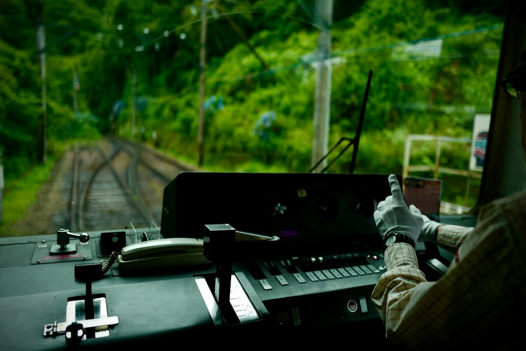 Technical director operating a multi-camera video switcher panel